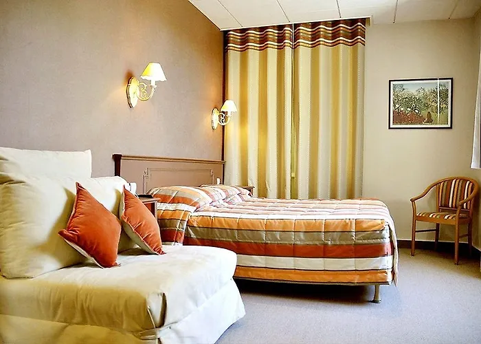 Logis Au Grand Et Son Restaurant Mayenne